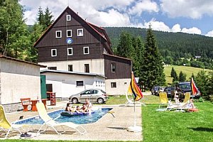 Krkonoše v horském hotelu Flora s polopenzí a vytápěným venkovním bazénem