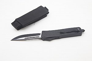 Mikrotek vystřelovací nůž s hrotem na rozbití skla